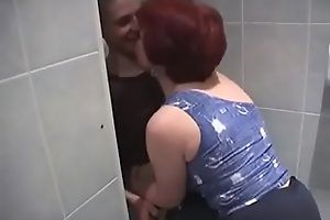 Russian Old woman and lass in go to the loo