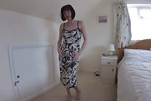 Wife Does Exaggeration in Cocktail Dress