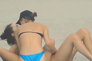 Lesbian Couple Fingering On tap the Seashore