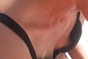 Wife’s nipple slip shows – broad in the beam nipples at pool – bikini slip