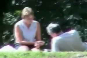 Voyeur tapes a slut wife having sex with 3 guys in the park